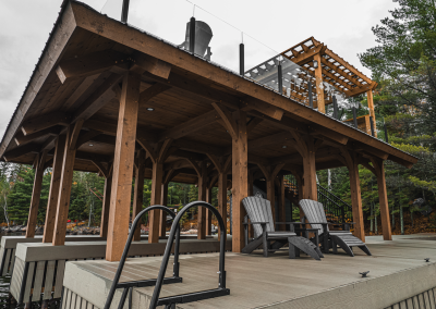 View from the water of boathouse and lounge area.