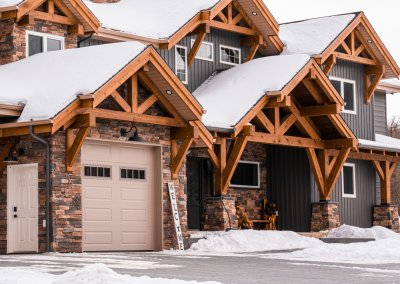 Front view of timber framed home in Manitoba.