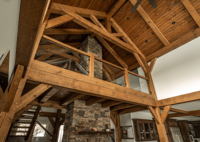 Interior view of the fireplace on large timber home.