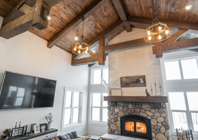 Fireplace and timberframed room.