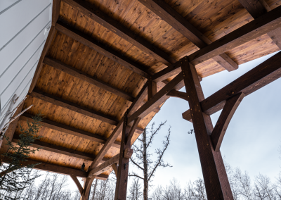 Timber framed covered entry.