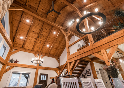 Wide view of timber framed house.