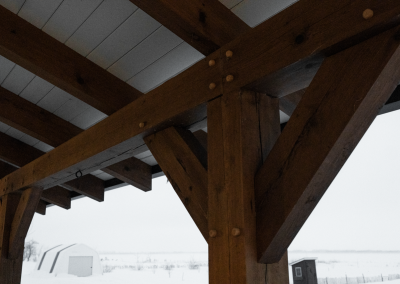 Post and braces on covered timber entryway