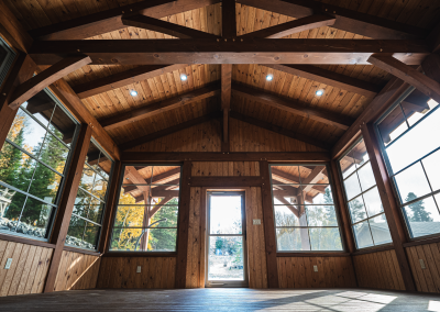 Interior vestibule of timber framed guest house on the water.