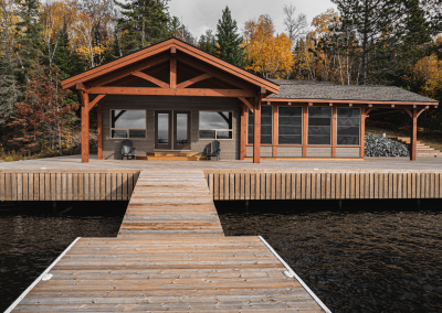 Timber dock and guest house on the water.