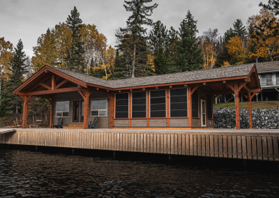 View from the water of a custom timberframed guest house.