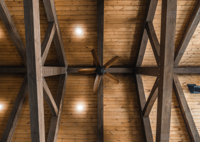 Timber ceiling with ceiling fan.