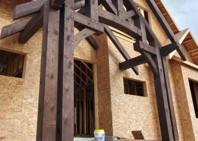 Early framing on timber frame entry.