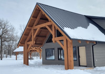 Gable view of Hammer Beam timber framed entryway.