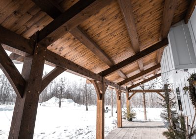 Covered timber frame entryway.